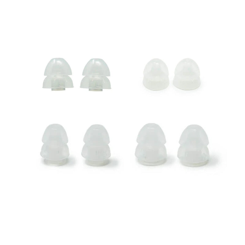 Set of white silicone earbud tips on a white background